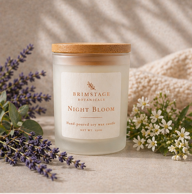 Brimstage Botanicals Night Bloom Candle with lid sat next to freshly cut lavender.