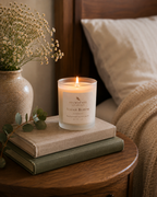 Brimstage Botanicals Night Bloom candle - lit in bedroom creating a calming atmosphere in preparation for a peaceful nights sleep. 